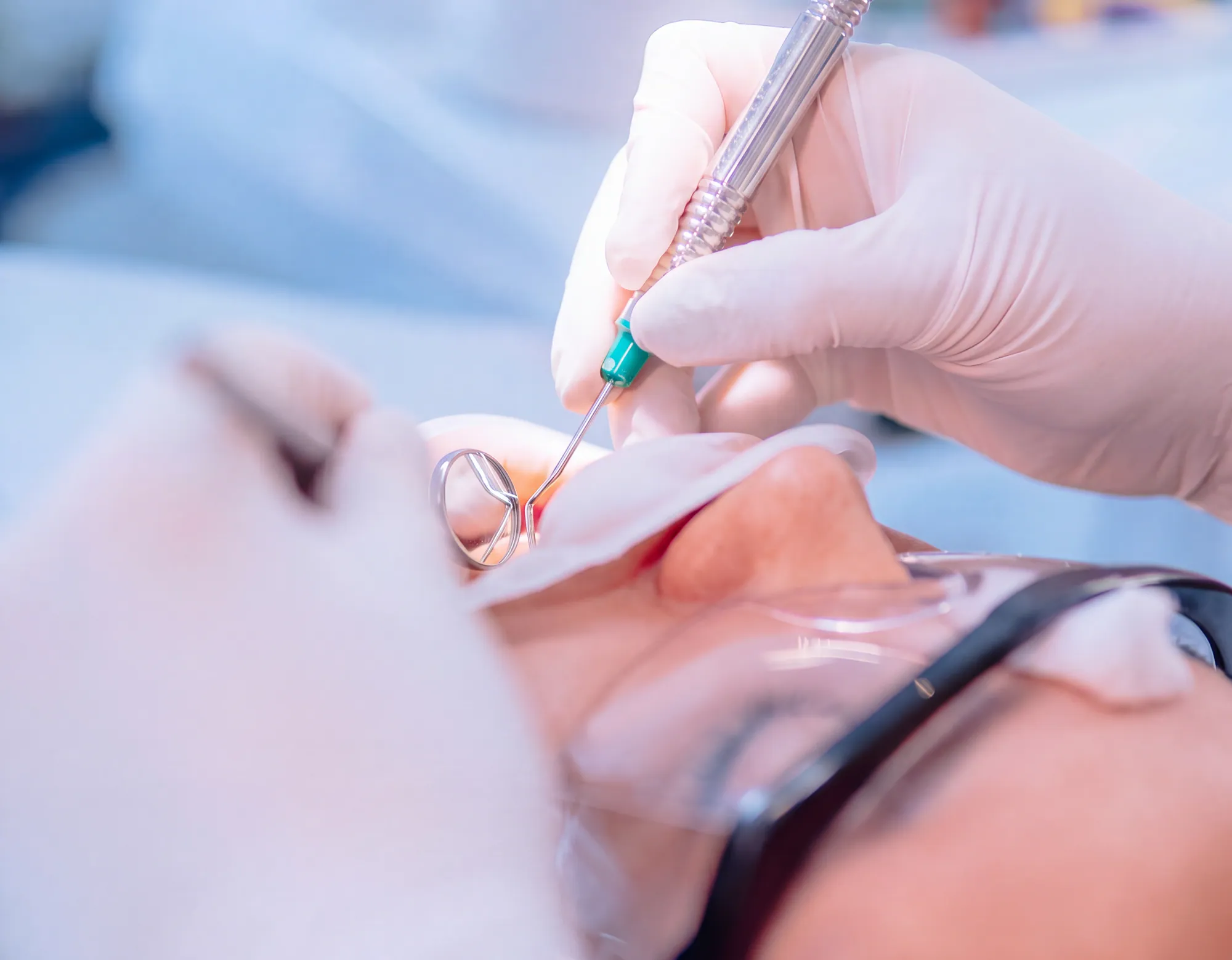 A dentist working on a patient